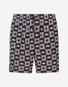 DOLCE & GABBANA MID SWIMMING TRUNKS WITH CROWN PRINT AND POUCH BAG