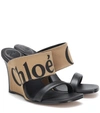 CHLOÉ CANVAS AND LEATHER WEDGE SANDALS,P00366182