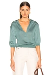 TIBI TIBI SHORT SLEEVE POLO PULLOVER IN GREEN.,TBIF-WK23