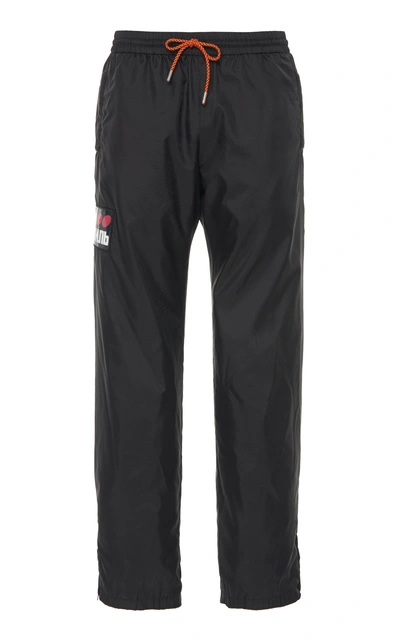 Heron Preston Logo-appliquéd Shell Joggers In Black