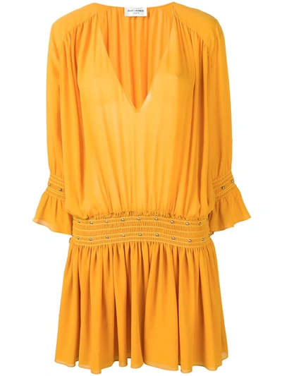 Saint Laurent Smocked Drop-waist V-neck Mini Dress In Yellow