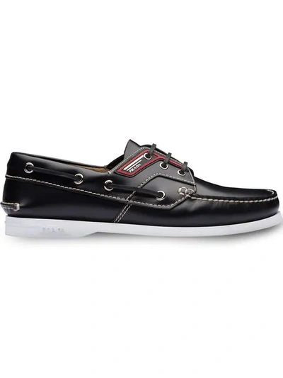 Prada Brushed Leather Boat Shoes In Black