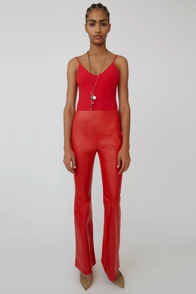 Acne Studios Leather-front Bootcut Trousers In Sharp Red