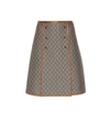 GUCCI GG LEATHER-TRIMMED SKIRT,P00364610