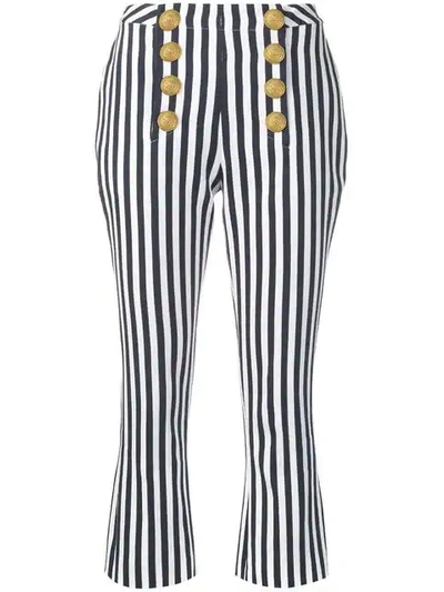 Balmain Cropped Button-embellished Striped Cotton-drill Flared Pants In Navy