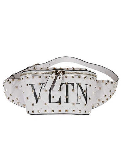 Valentino Garavani Spike Embellished Vltn Leather Belt Bag In Vp Bianco Nero