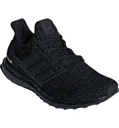 Adidas Originals Ultraboost Lace-up Knit Running Sneakers In Core Black/ Gold Metallic