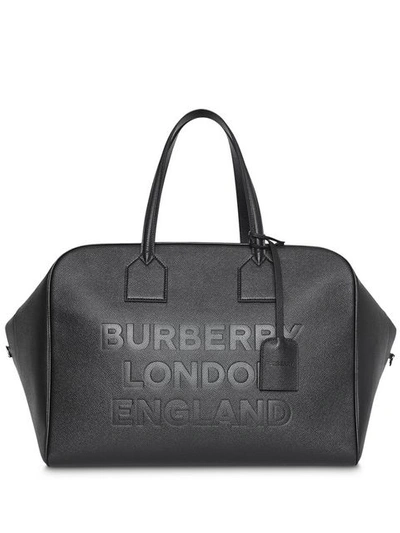 Burberry Logo Embossed Leather Holdall In Black