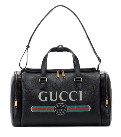 Gucci Print Leather Travel Bag In Black