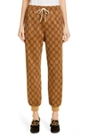 Gucci Gg Print Technical Jersey Jogger Pants In Neutrals