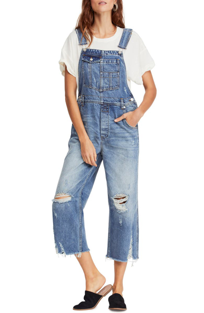 Free People Distressed Cropped Denim Overalls In Light Denim