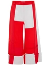 JW ANDERSON EXCLUSIVE PILLARBOX RED PATCHWORK PANELLED TROUSERS