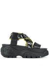 Buffalo London Bo Chunky Flatform Logo Sandals In Black