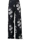 MCQ BY ALEXANDER MCQUEEN FLORAL PRINTED TROUSERS