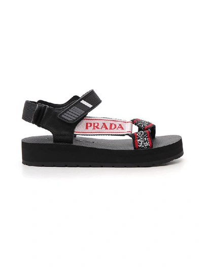 Prada Logo-embossed Rubber-trimmed Leather And Canvas Sandals In F0n98 Black