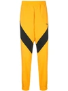 YOSHIOKUBO YOSHIOKUBO 条纹细节运动裤 - 黄色
