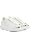 ALEXANDER MCQUEEN Embellished leather sneakers,P00375928