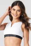 CALVIN KLEIN OPEN BACK CROP TOP WHITE