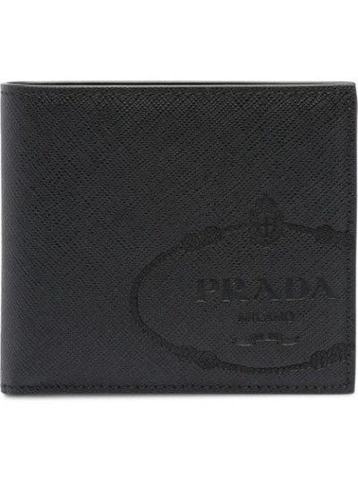 Prada Logo Embossed Wallet In Black