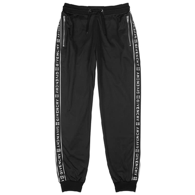 Givenchy Tapered Logo-jacquard Fleece-lined Tech-jersey Sweatpants In Black