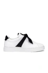 Alexandre Birman Clarita Bow-embellished Suede-trimmed Leather Slip-on Sneakers In Black & White