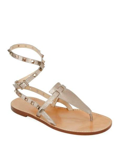 Valentino Garavani Rockstud Alce Metallic Ankle-wrap Thong Flat Sandals In Beige