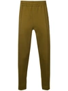 AMI ALEXANDRE MATTIUSSI TRACKPANTS WITH AMI HEART PATCH AND ZIPPED POCKETS AND HEM