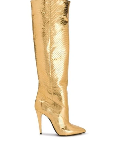 Saint Laurent Abbey Boots In Gold