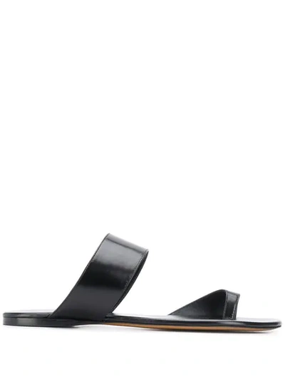 The Row Infradito Flat Leather Toe-strap Slide Sandals In Black