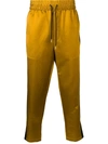 AMI ALEXANDRE MATTIUSSI TRACK PANTS WITH CONTRASTED SIDE BANDS