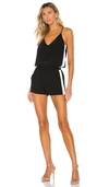 Amanda Uprichard Track Romper In Black Ivory Stripe