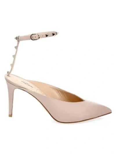 Valentino Garavani Rockstud Hype T-strap Leather Pumps In Poudre