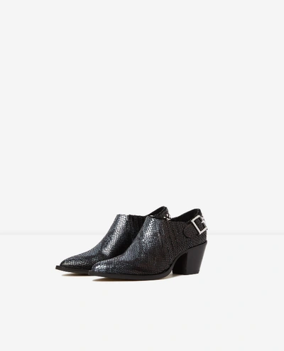 The Kooples Heeled, Western-style Black Ankle Boots