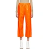 Mm6 Maison Margiela Crackled Shiny Leather Pants In Neon Orange