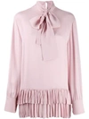 VALENTINO RUFFLE HEM BLOUSE