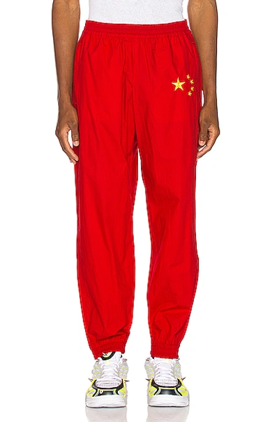 Vetements Flag Track Pants In Stars,red