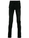 AMIRI BROKEN SKINNY JEANS