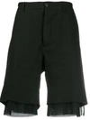 ANN DEMEULEMEESTER ANN DEMEULEMEESTER LAYERED HEM SHORTS - BLACK