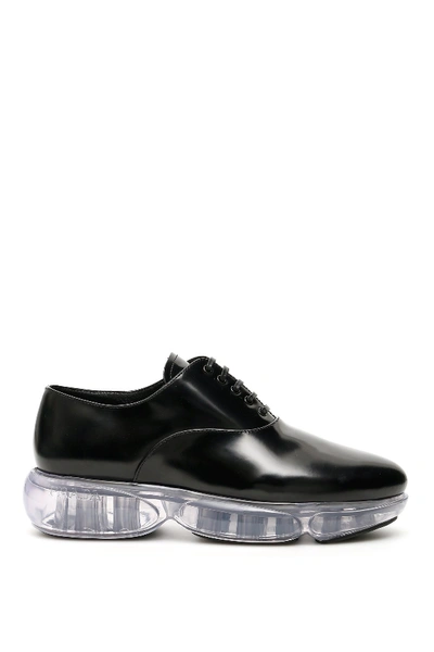 Prada Cloudbust Leather And Rubber Sneakers In Black