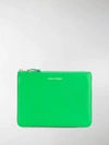 Comme Des Garçons Logo Print Leather Clutch In Green