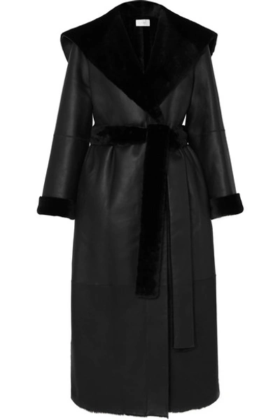 The Row Riona Hooded Belted Shearling Coat In Black