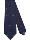GUCCI TIE WITH FLOWER AND G DETAIL