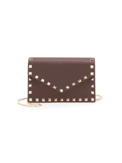 Valentino Garavani Rockstud Leather Pouch In Wine