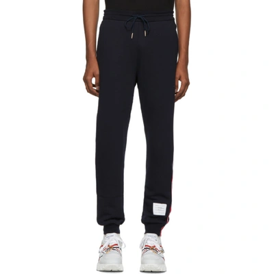 Thom Browne Tapered Grosgrain-trimmed Loopback Cotton-jersey Sweatpants In Navy