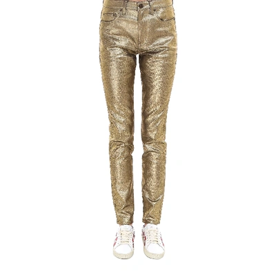 Saint Laurent Metallic Skinny Jeans In Gold