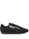 Prada Logo Patch Sneakers In F002 Nero