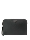 Prada Logo Plaque Zipped Clutch In Black