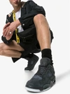 Nike X Kaws Air Jordan 4 Retro Sneakers - Black In Black