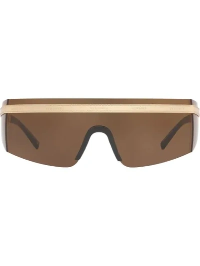 Versace Logo Band Visor Sunglasses In Gold