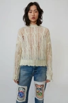 ACNE STUDIOS Frayed cable knit sweater Off white